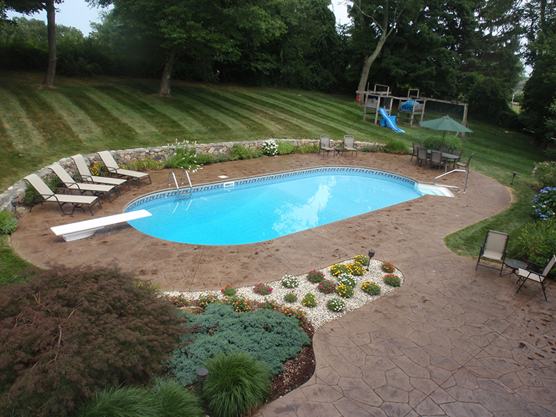 Swimming pool and stamped concrete project example 58